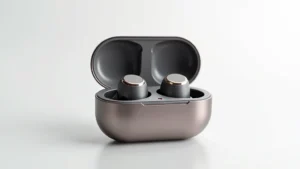 Premium wireless earbuds in charging case with sleek modern design, metallic finish, studio lighting, white background