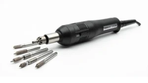 Professional electric nail drill with multiple carbide and diamond bits displayed, ergonomic handle design, 25000 RPM variable speed motor, stainless steel construction, close-up detail shot on white background